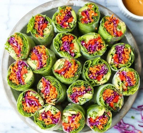 Fresh spring rolls served with a creamy peanut dipping sauce