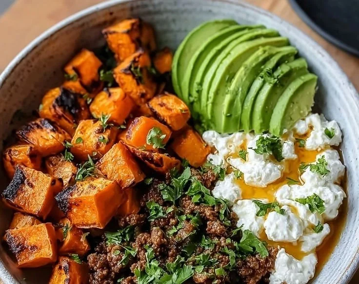 Viral Ground Beef Hot Honey Bowl 2 Viral Ground Beef Hot Honey Bowl topped with fresh herbs and chili flakes.