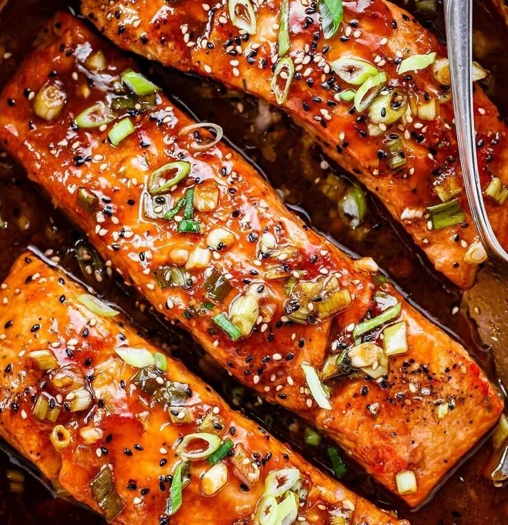 Baked Teriyaki Salmon with a flavorful glaze and garnished with green onions