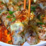 Delicious easy vegan napa cabbage rolls filled with savory ingredients