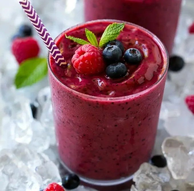 Delicious frozen fruit smoothie with vibrant colors and fresh ingredients
