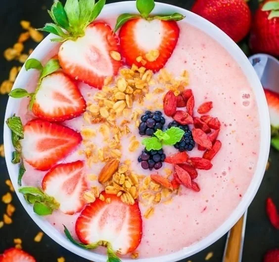 Strawberry Pineapple Smoothie Bowl 4 Delicious strawberry pineapple smoothie bowl topped with fresh fruits and seeds.