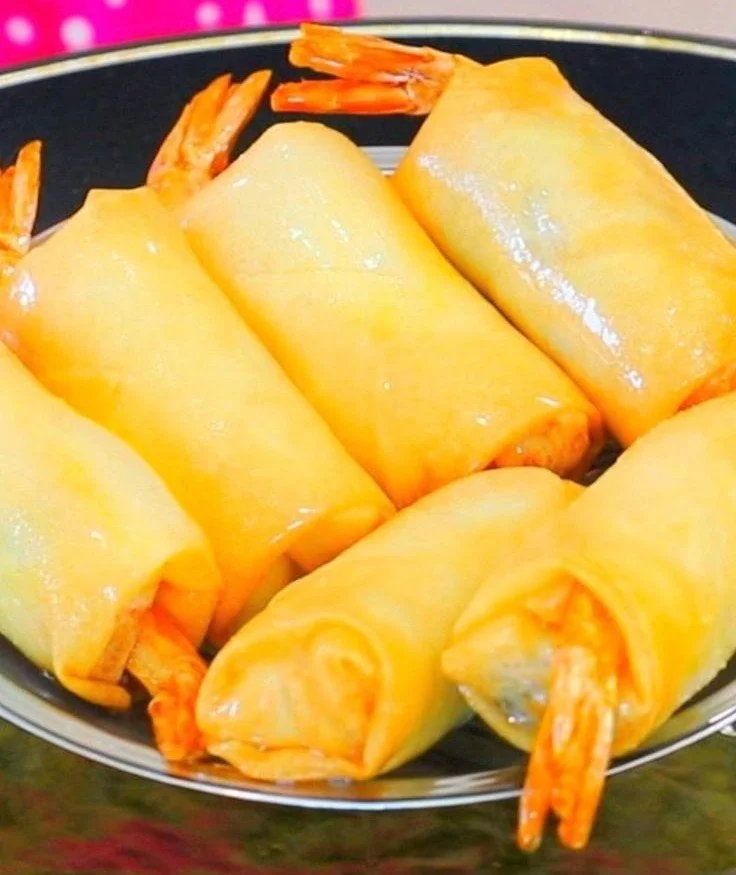 Delicious homemade shrimp spring rolls served with dipping sauce