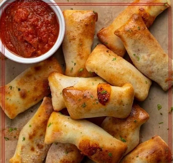 Air Fryer Pizza Rolls 4 Crispy air fryer pizza rolls ready to be served