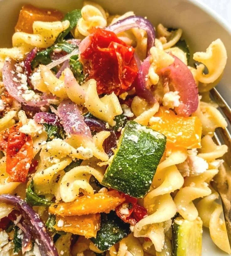 Baked Feta Pasta 4 Baked feta pasta dish with tomatoes and herbs on a plate