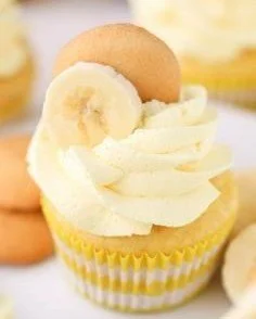Banana Cream Cupcakes 4 Delicious homemade Banana Cream Cupcakes with cream frosting and banana slices