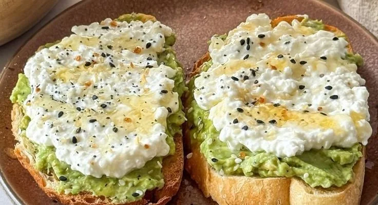Easy Cottage Cheese Avocado Toast 4 Delicious cottage cheese avocado toast topped with fresh herbs.