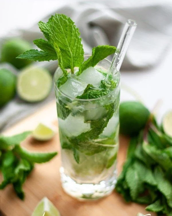 Refreshing Mojito Mocktail served in a glass with mint and lime garnish