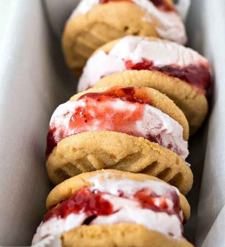 PB&J Ice Cream Sandwiches 4 Delicious PB&J ice cream sandwiches featuring creamy peanut butter and jam.