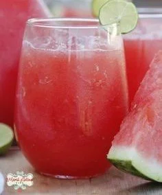 Refreshing watermelon agua fresca served in a glass with fresh slices
